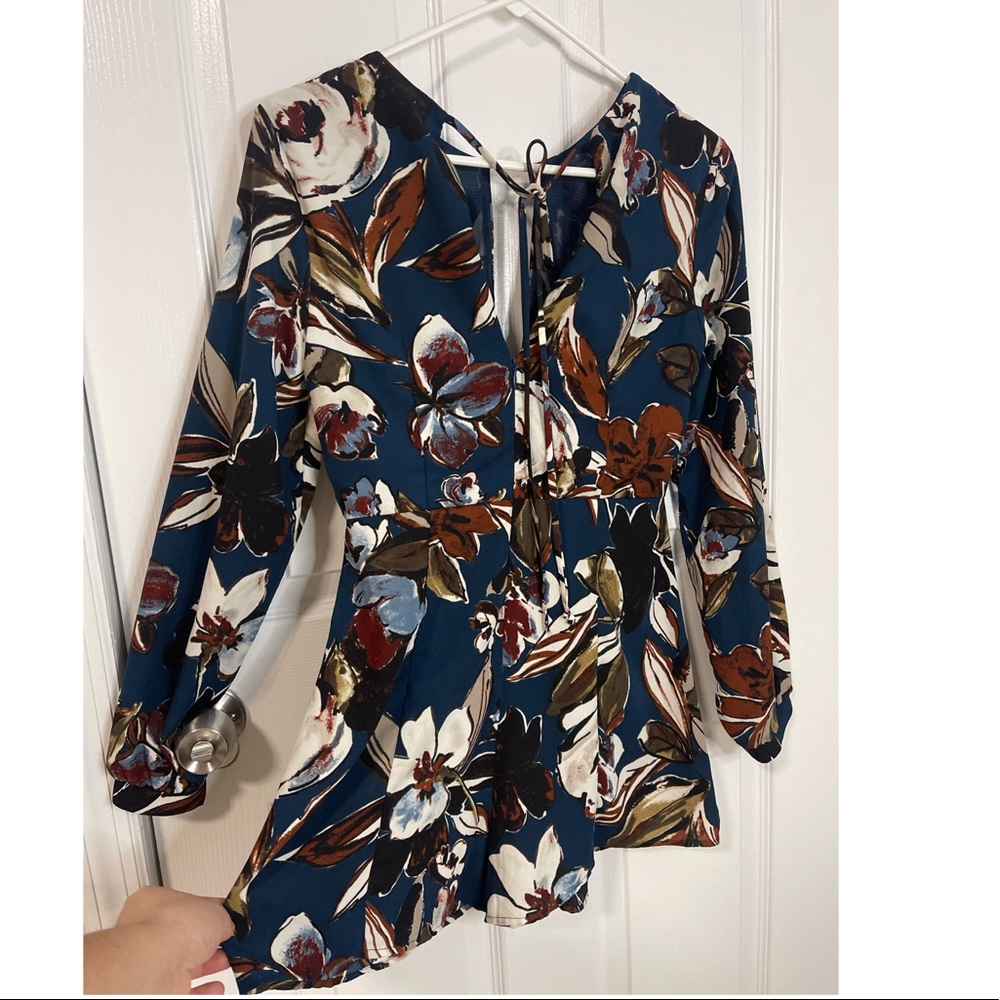 It is a shot dress with long sleeves a nice party size S